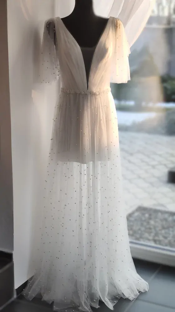 Svatební šaty s perlami